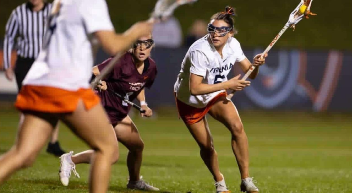 Midfield master: University of Virginia women’s lacrosse player and Class of 2023 alumna Kate Galica travels down the field in pursuit of a goal. Galica set multiple draw control records at UVA.